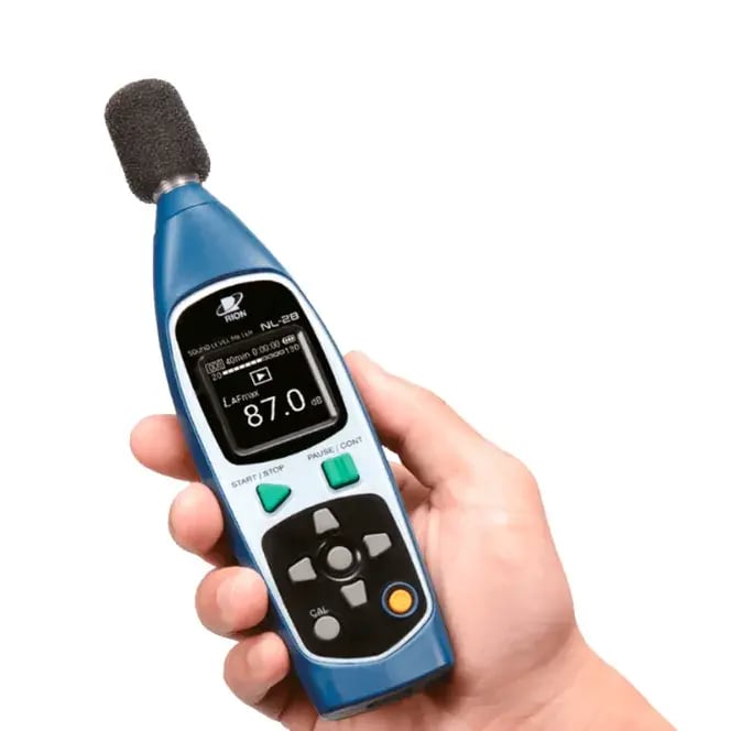 NL-28 sound level meter in hand